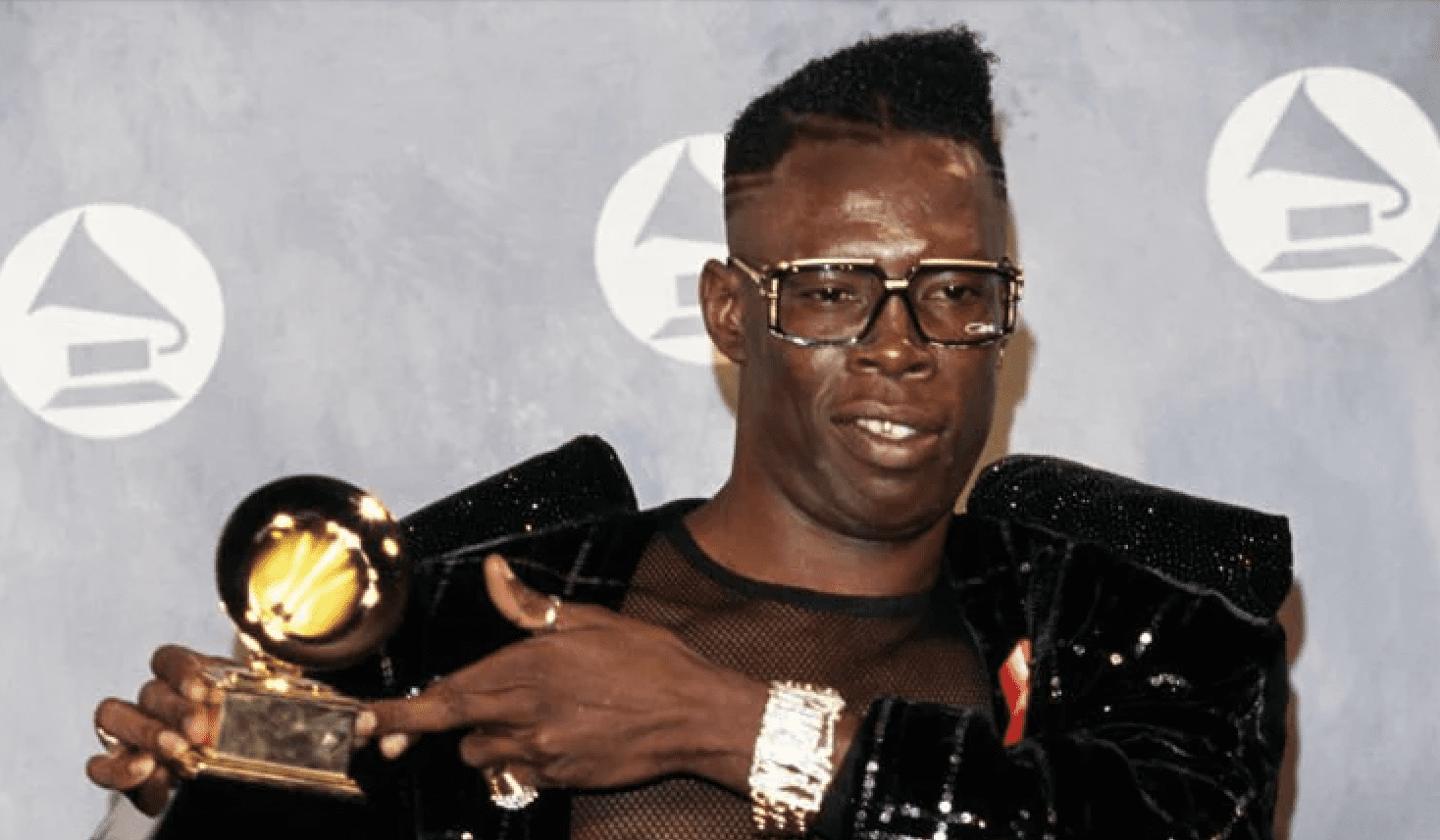 Shabba Ranks pose with Grammy award in 1992. Ranks is the first dancehall artist to win a grammy Award. He won Best Reggae Album in 1992 for "As Raw as Ever" and in 1993 for "X-tra Naked"