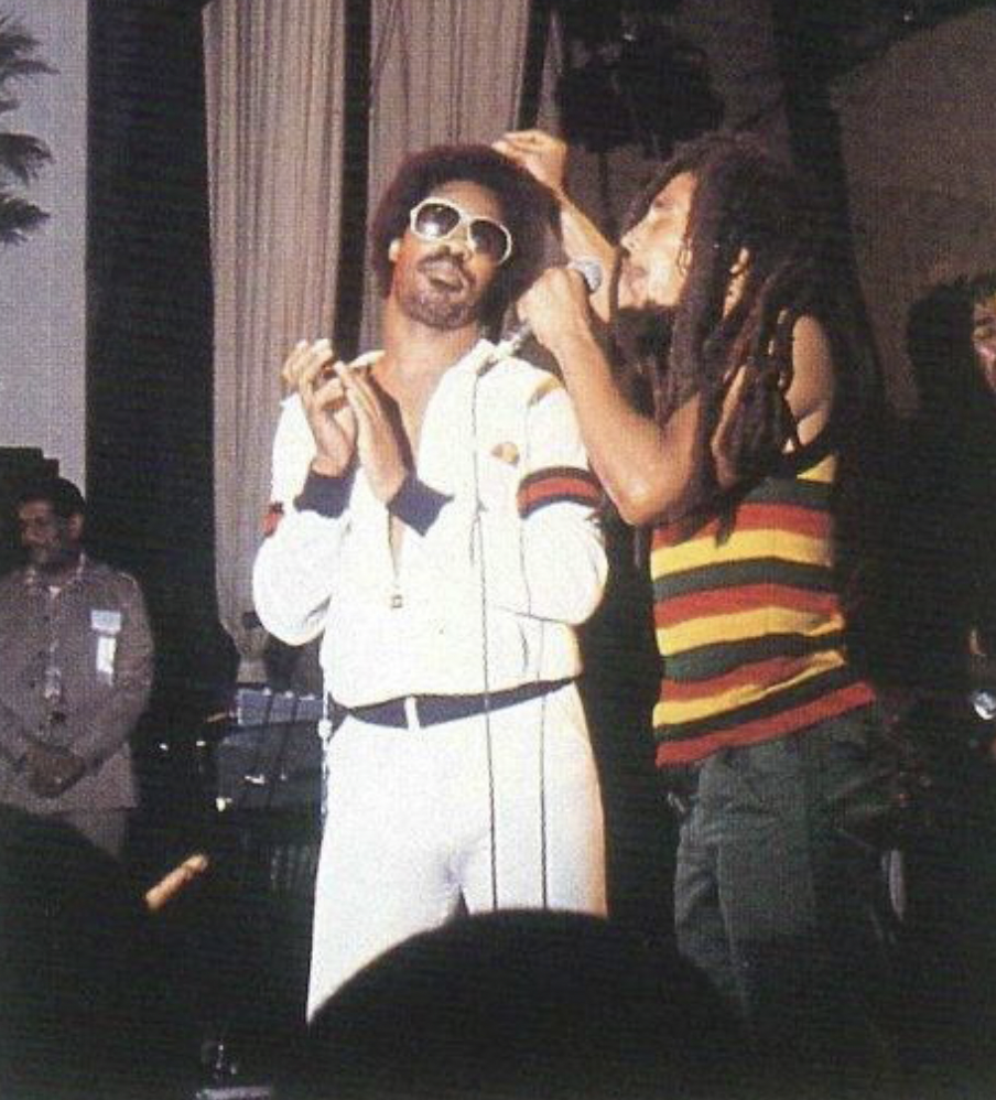 Steven Wonder and Bob Marley perfuming together onstage