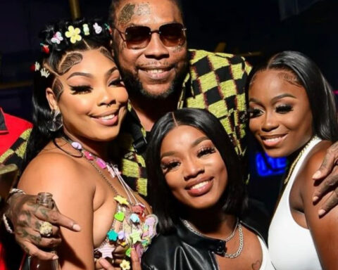 Vybz Kartel along with proprietor of Dolly Sundays Rebel (center_ TC (right) and Pretty.