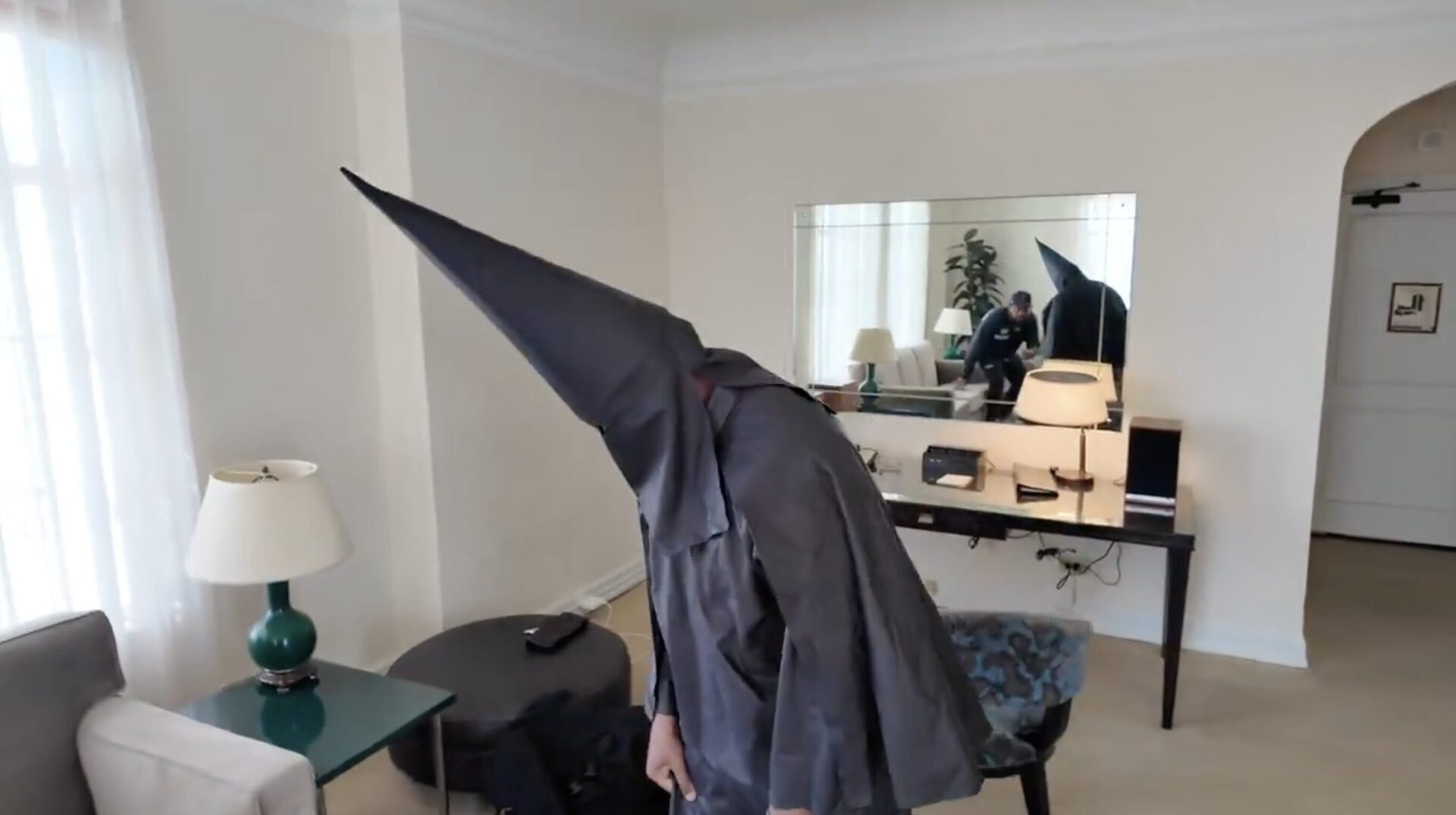 Kanye West in black hoodie